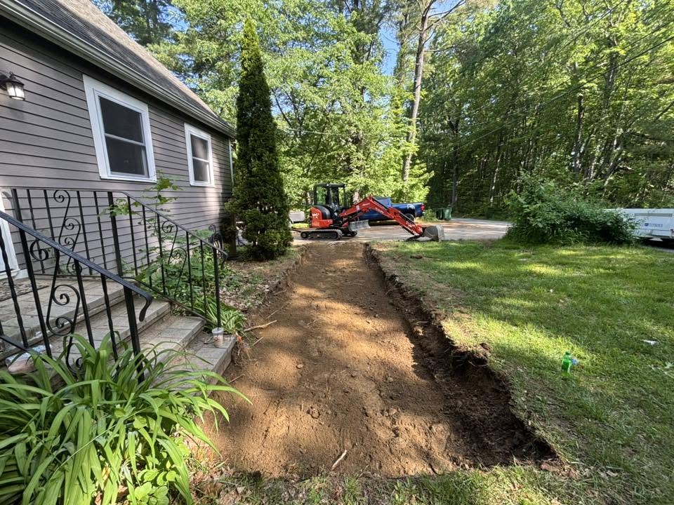 Properly excavated walkway base in Leicester, MA — even depth throughout
